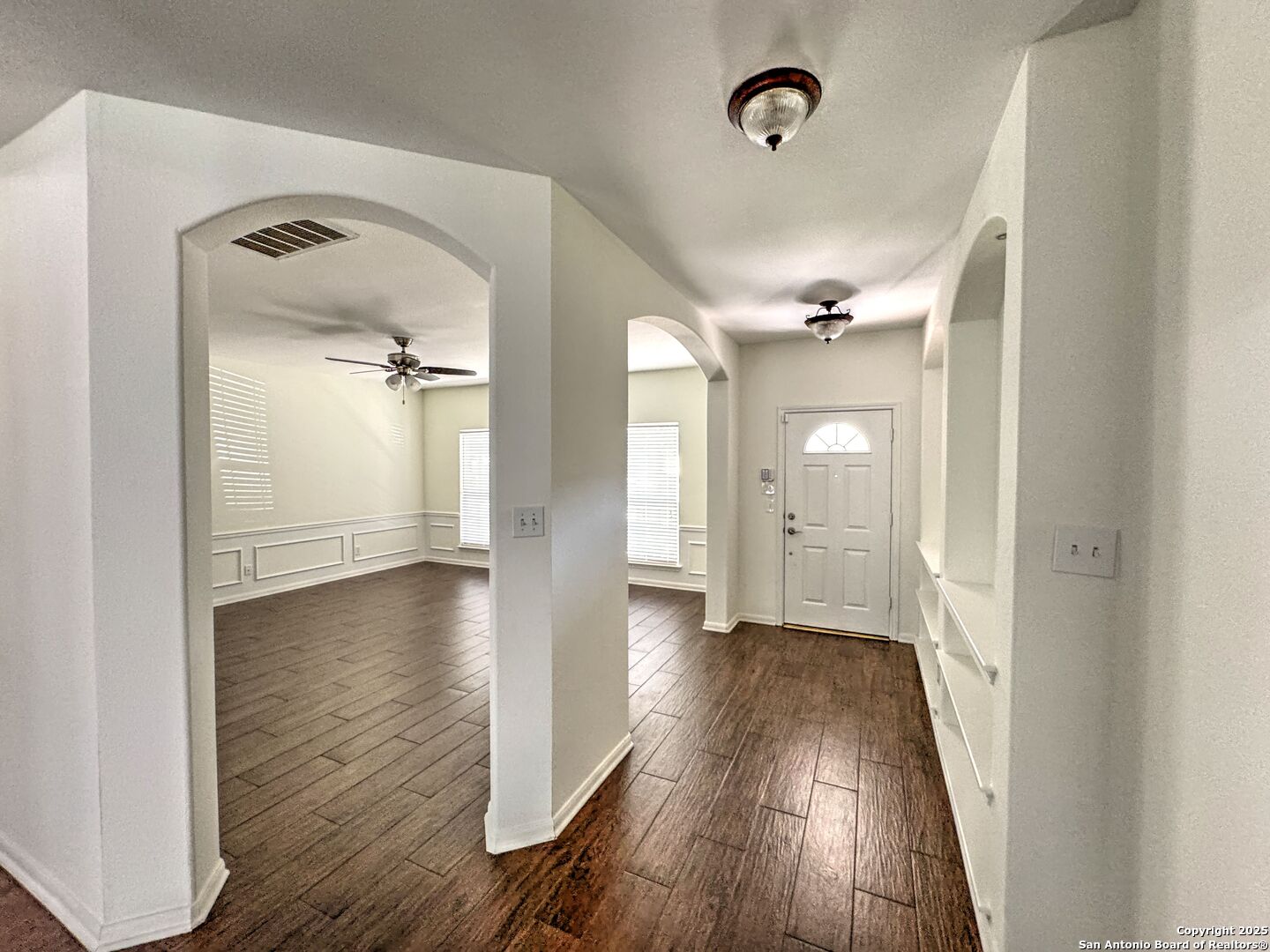 8711 Sandia Circle Helotes, TX 78023 - Photo 2 of 40 a view of a hallway with wooden floor