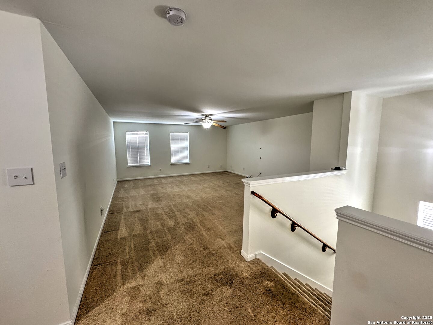 8711 Sandia Circle Helotes, TX 78023 - Photo 27 of 40 a view of a hallway with windows