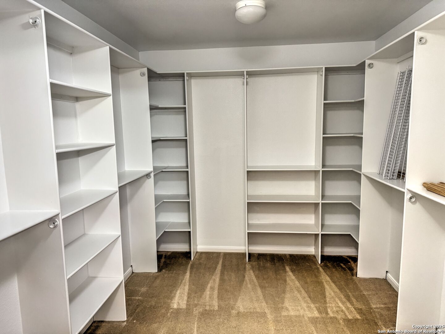 8711 Sandia Circle Helotes, TX 78023 - Photo 31 of 40 a view of an empty walk in closet