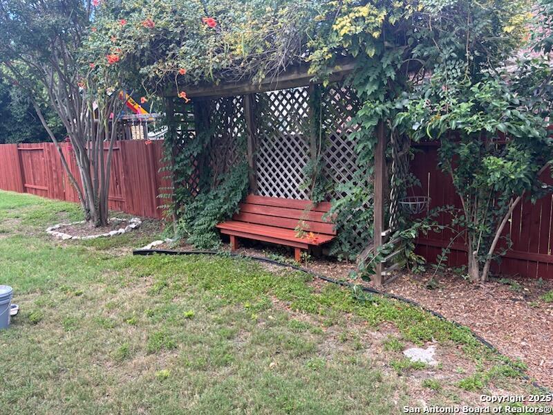 8711 Sandia Circle Helotes, TX 78023 - Photo 40 of 40 a garden view with a sitting space