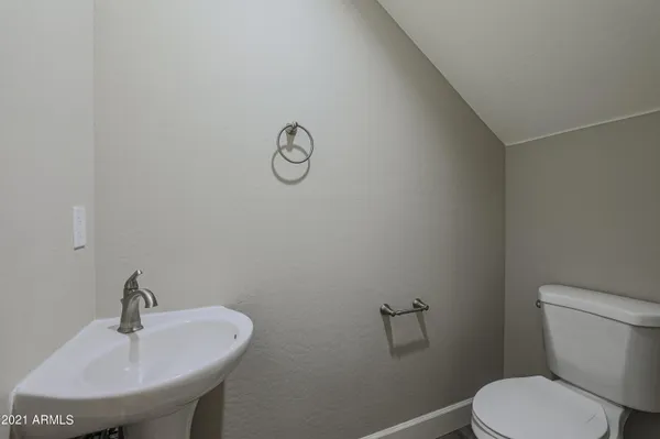 a bathroom with a sink and a toilet