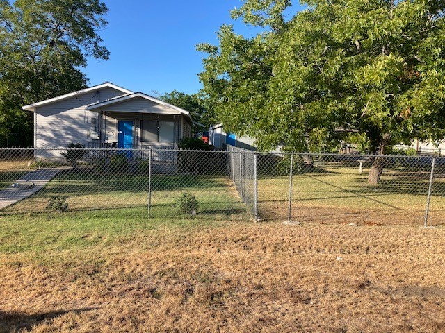 605 Blanco Street Kyle, TX 78640 - Photo 1 of 1 a view of a house with a yard