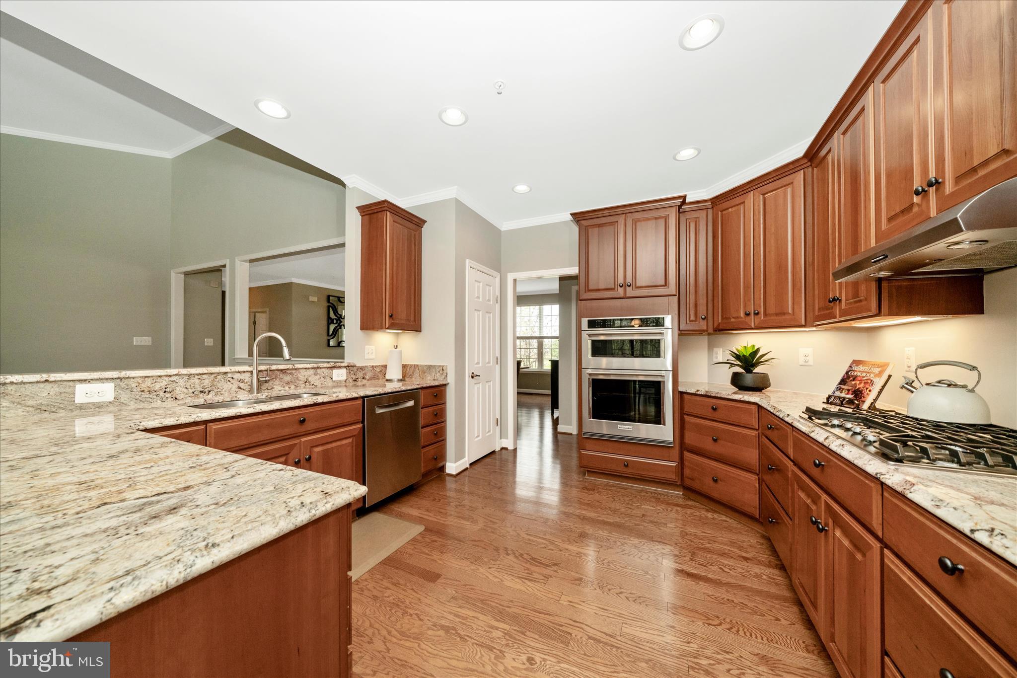 3156 Sumantown Road Middletown, MD 21769 - Photo 11 of 62 a kitchen with stainless steel appliances granite countertop a stove top oven a sink and dishwasher