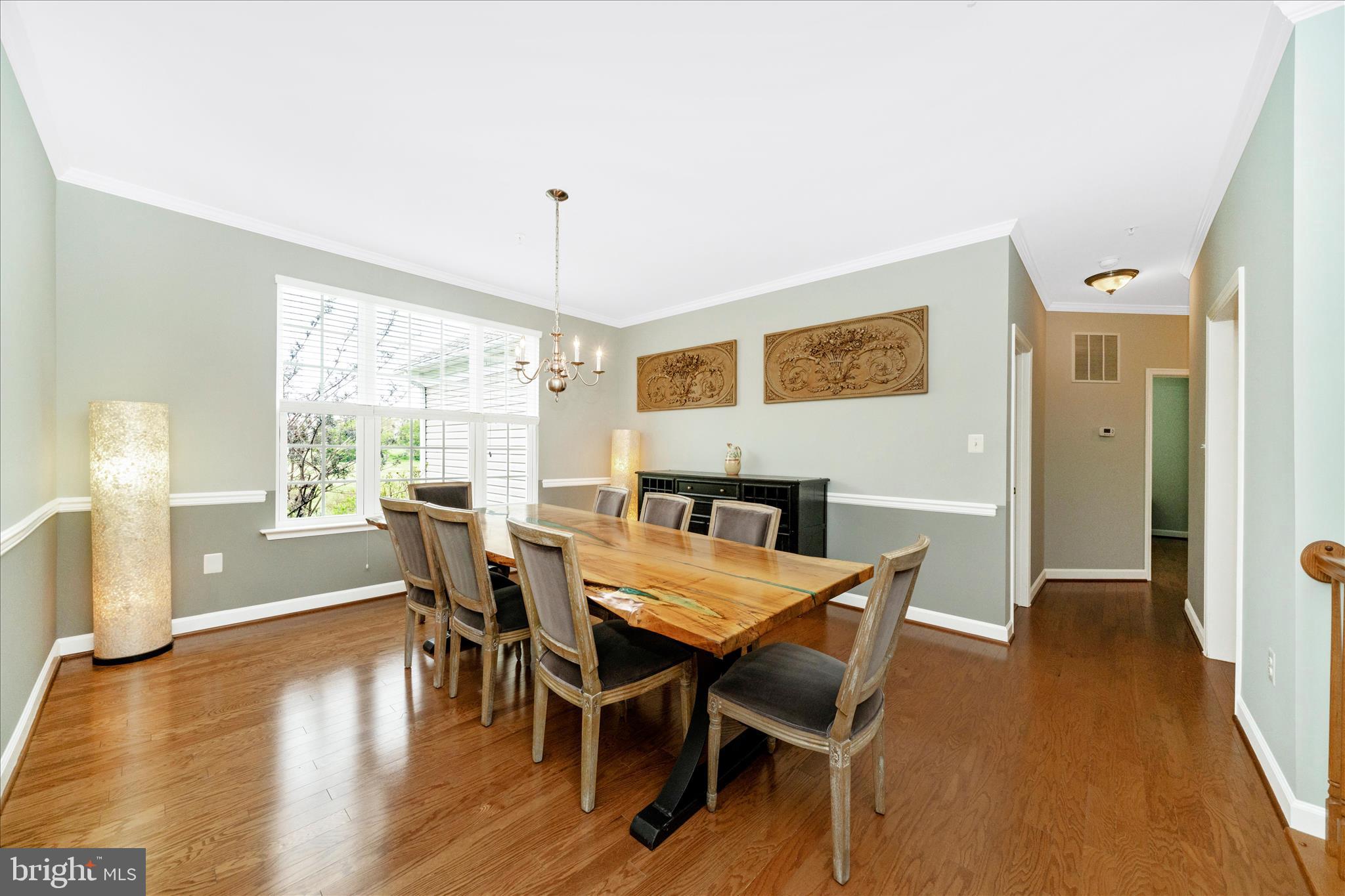 3156 Sumantown Road Middletown, MD 21769 - Photo 21 of 62 a view of a dining room with furniture window and wooden floor