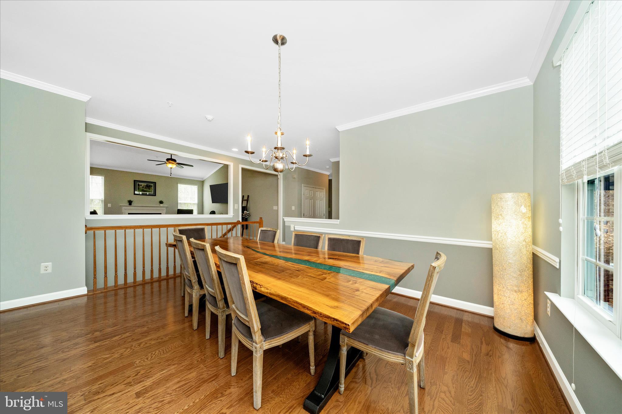 3156 Sumantown Road Middletown, MD 21769 - Photo 22 of 62 a view of a dining room with furniture window and wooden floor