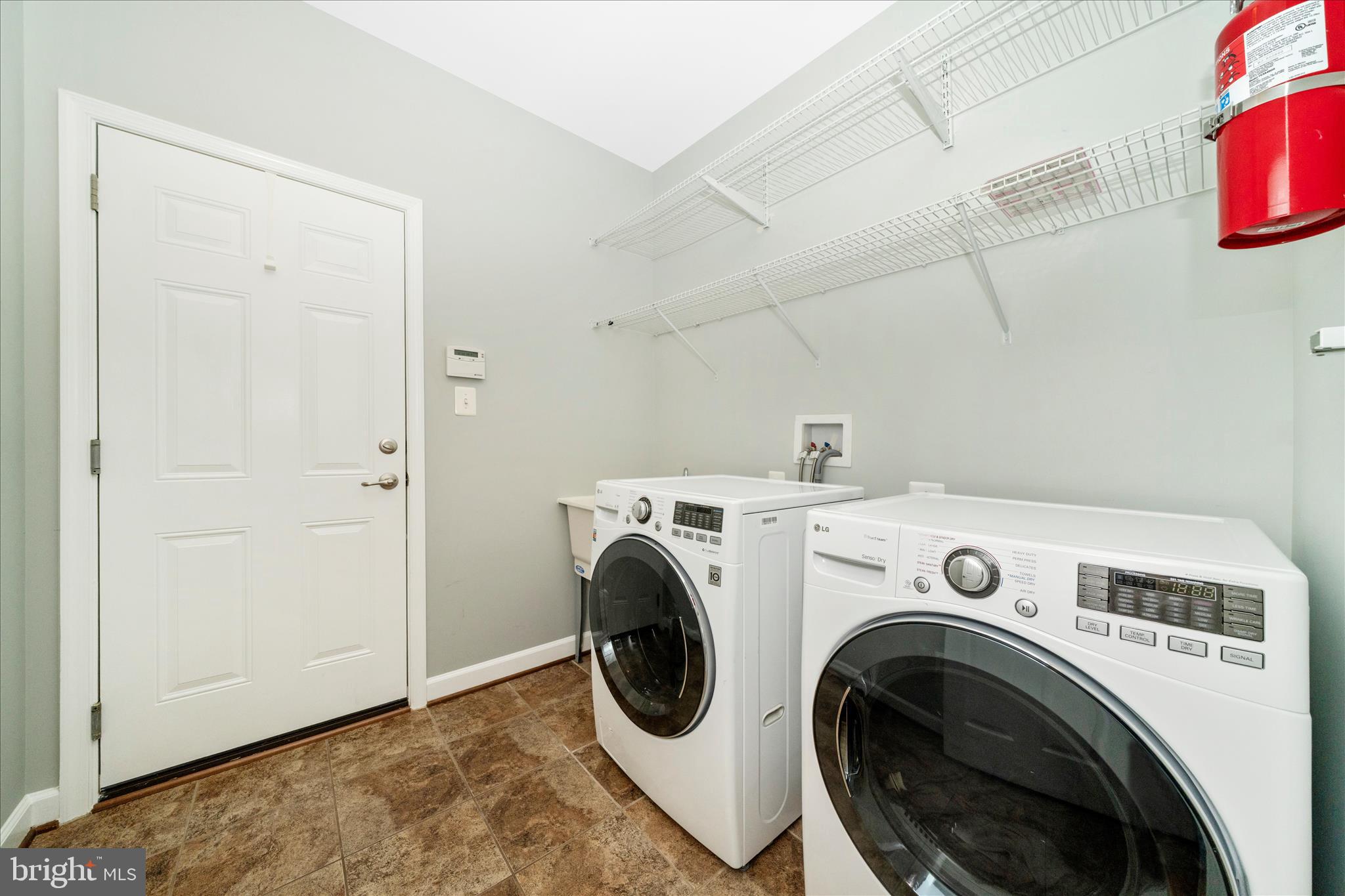 3156 Sumantown Road Middletown, MD 21769 - Photo 26 of 62 a utility room with dryer and washer