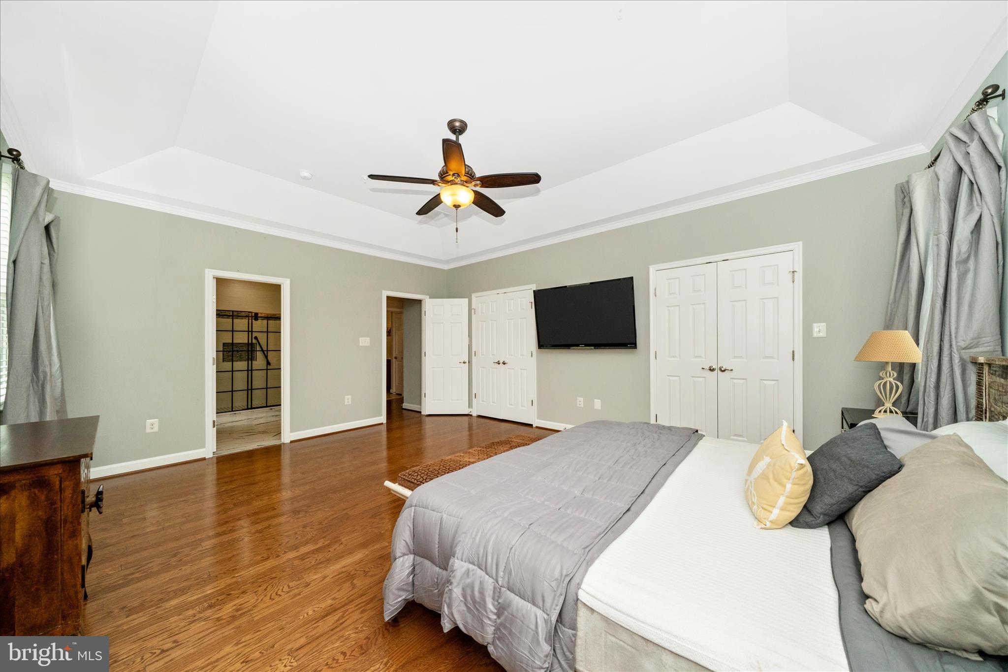 3156 Sumantown Road Middletown, MD 21769 - Photo 29 of 62 a bedroom with a bed and a flat screen tv