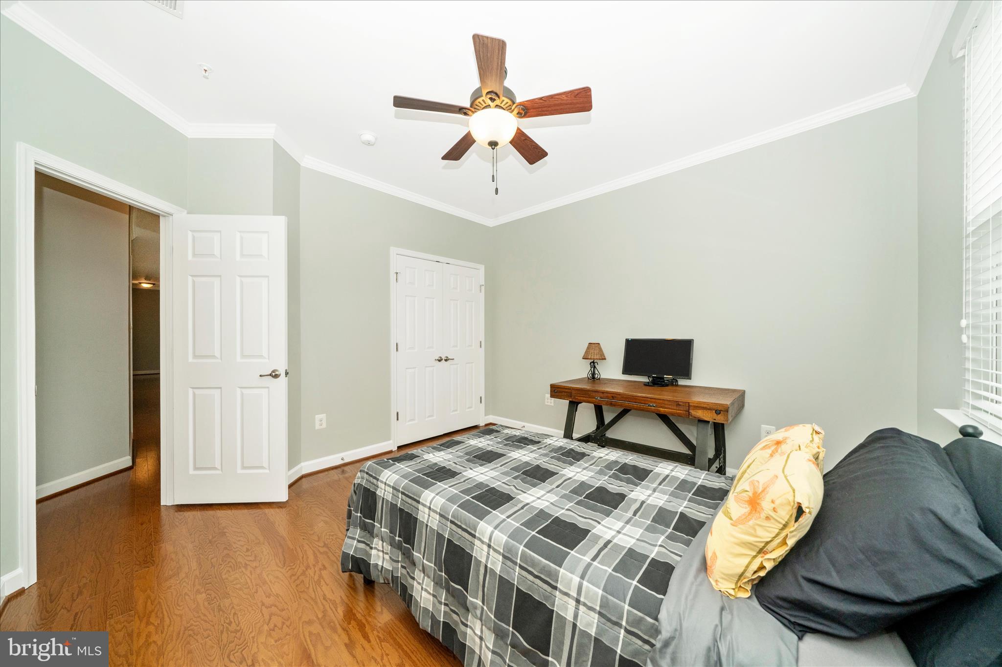 3156 Sumantown Road Middletown, MD 21769 - Photo 35 of 62 a bedroom with a bed and a chandelier