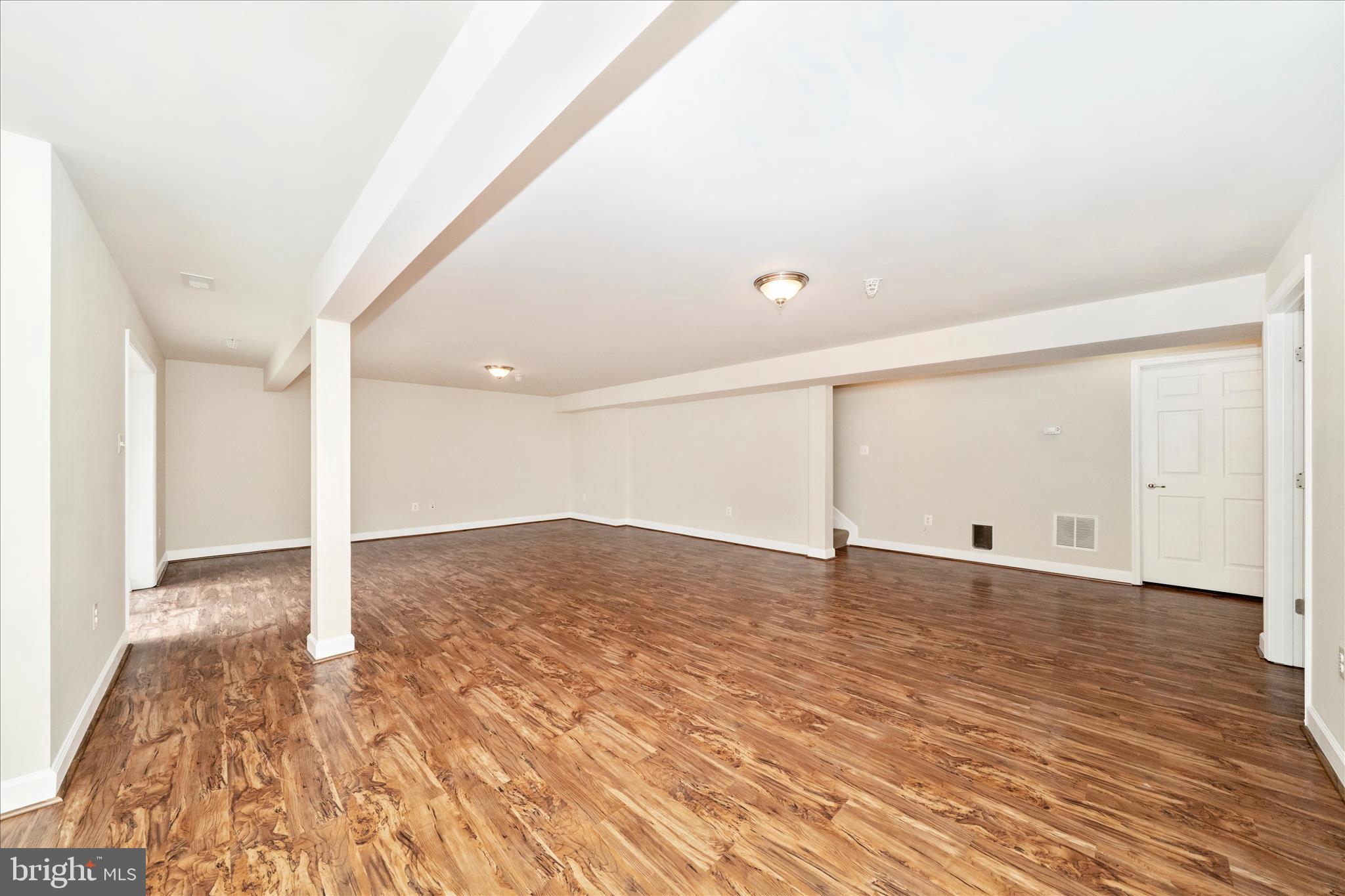 3156 Sumantown Road Middletown, MD 21769 - Photo 40 of 62 a view of a room with wooden floor