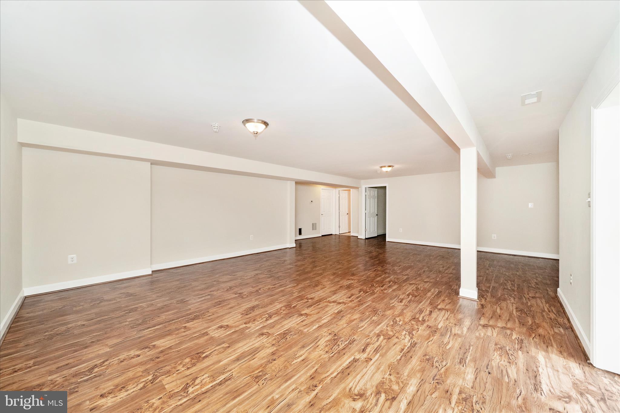 3156 Sumantown Road Middletown, MD 21769 - Photo 41 of 62 a view of empty room with wooden floor