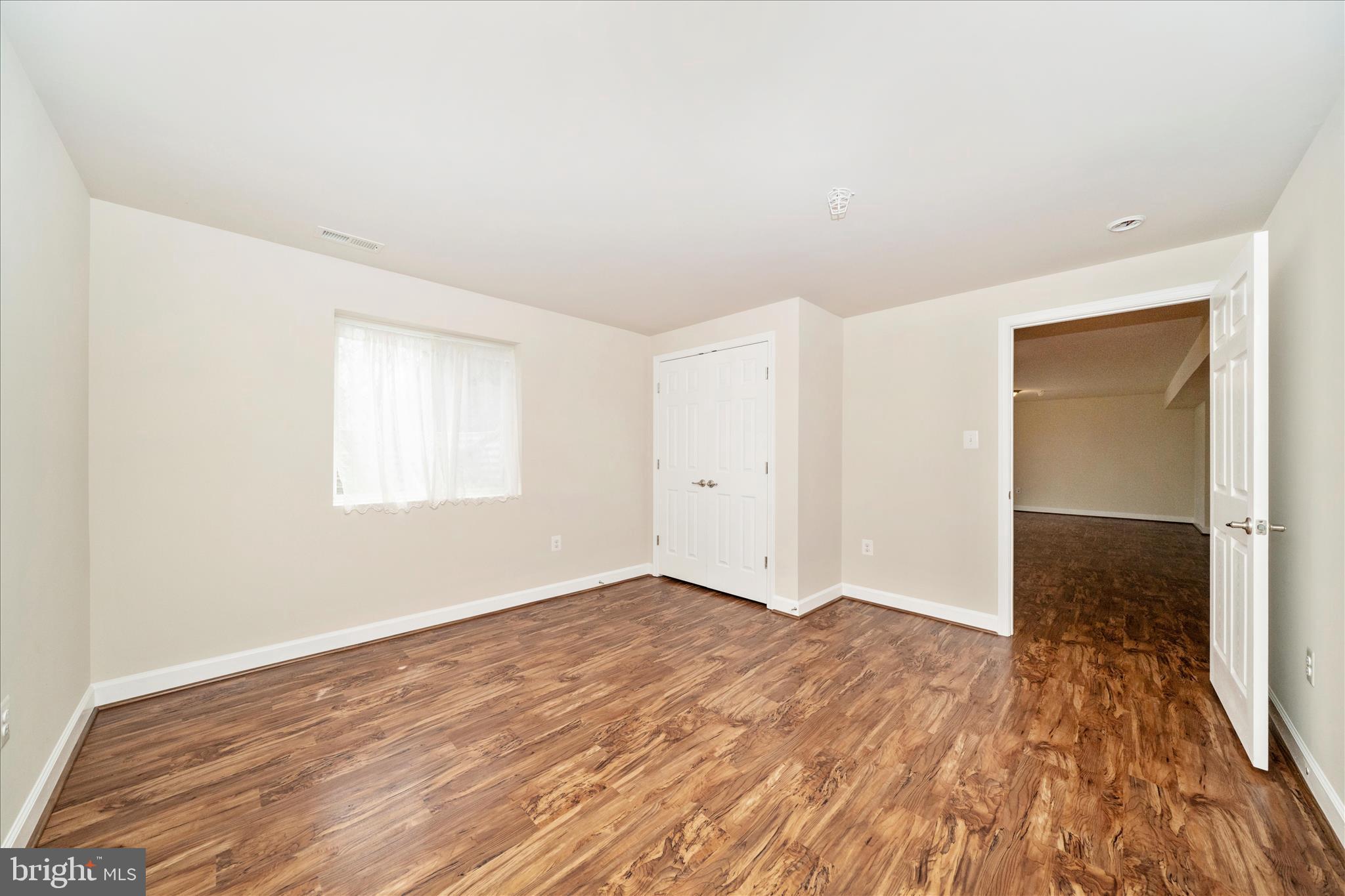 3156 Sumantown Road Middletown, MD 21769 - Photo 45 of 62 wooden floor in an empty room
