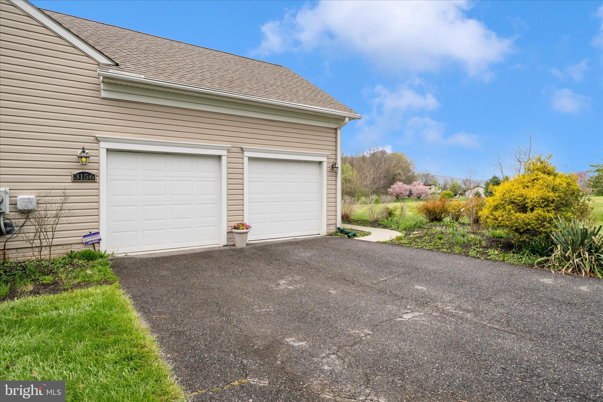 3156 Sumantown Road Middletown, MD 21769 - Photo 55 of 62 a view of a house with a yard and garage