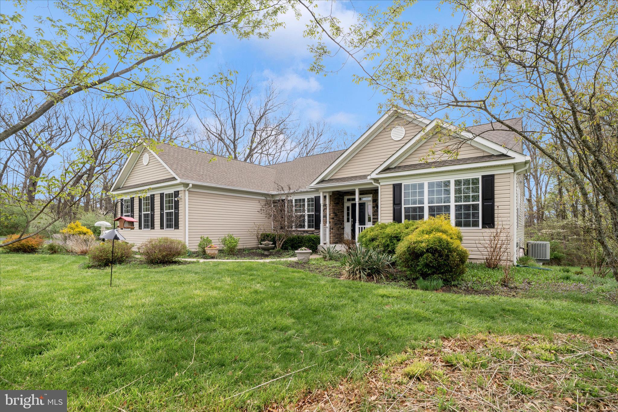 3156 Sumantown Road Middletown, MD 21769 - Photo 61 of 62 a front view of a house with a garden and yard