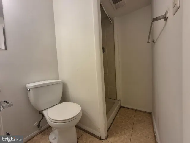 a bed room with a bed and a couch