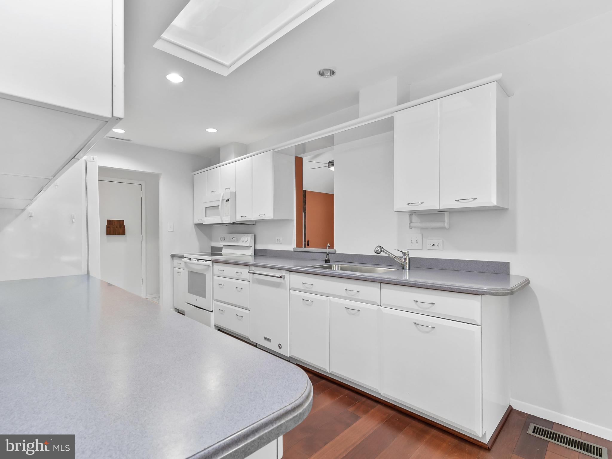 116 Delford Avenue Silver Spring, MD 20904 - Photo 10 of 30 Hardwood Floors, Skylight, Recessed Lights