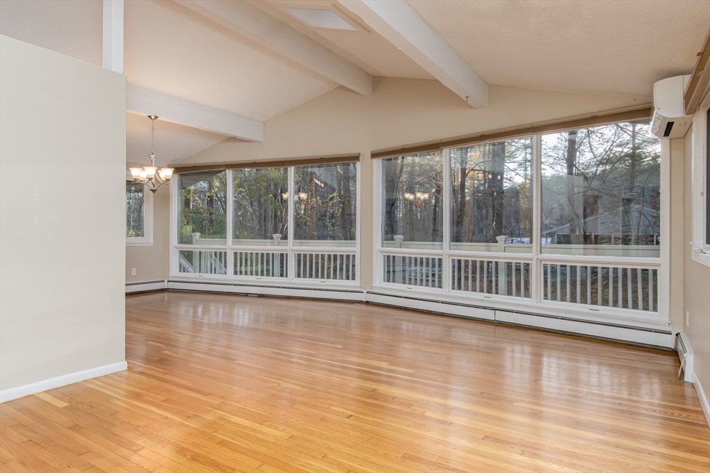 7 No Name Road Stow, MA 01775 - Photo 15 of 42 wooden floor in an empty room with a large window
