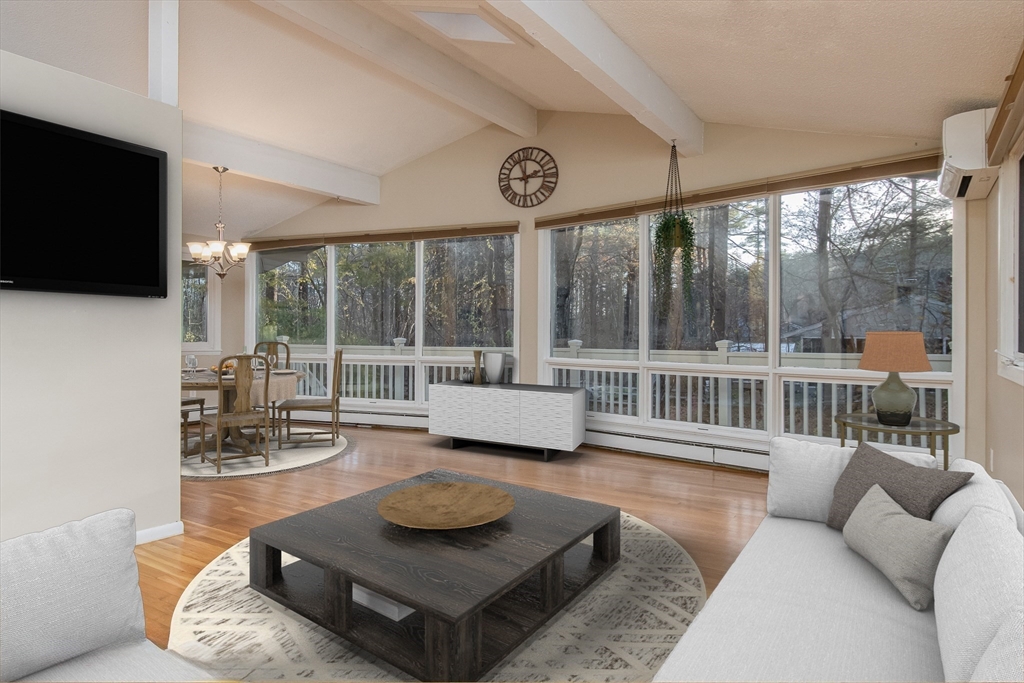 7 No Name Road Stow, MA 01775 - Photo 16 of 42 a living room with furniture and a flat screen tv