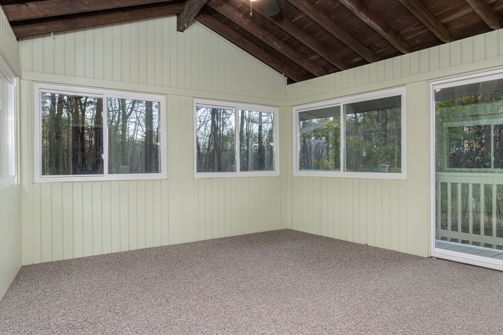 7 No Name Road Stow, MA 01775 - Photo 21 of 42 a view of an empty room with a window