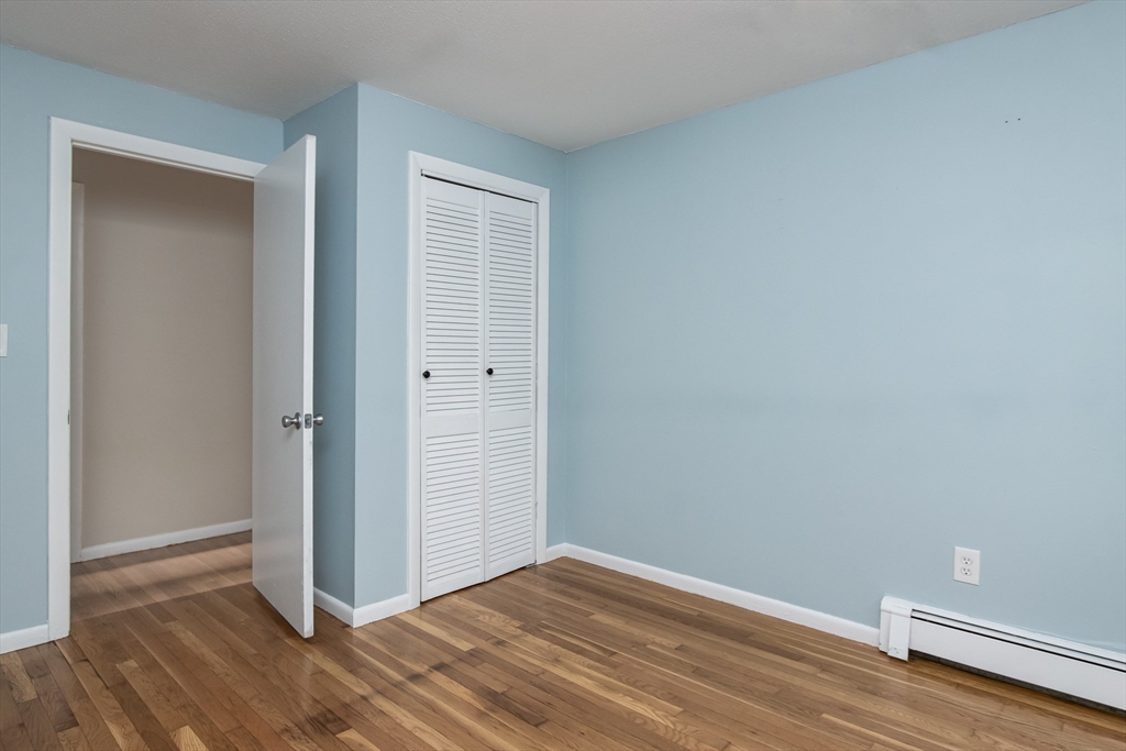 7 No Name Road Stow, MA 01775 - Photo 28 of 42 a view of room with wooden floor