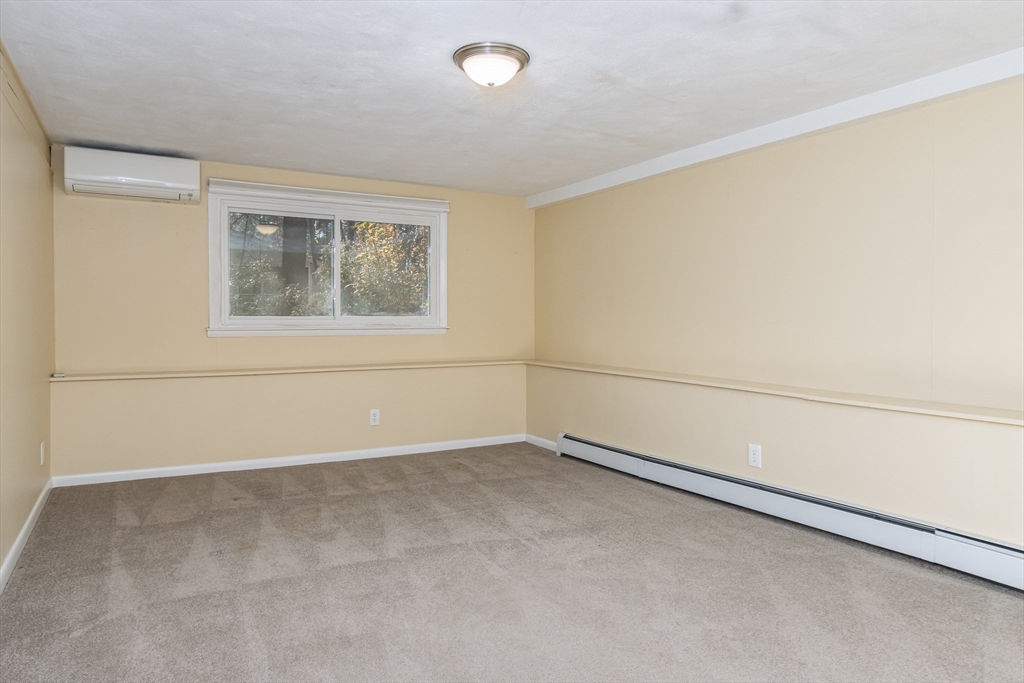 7 No Name Road Stow, MA 01775 - Photo 29 of 42 an empty room with a empty space and window