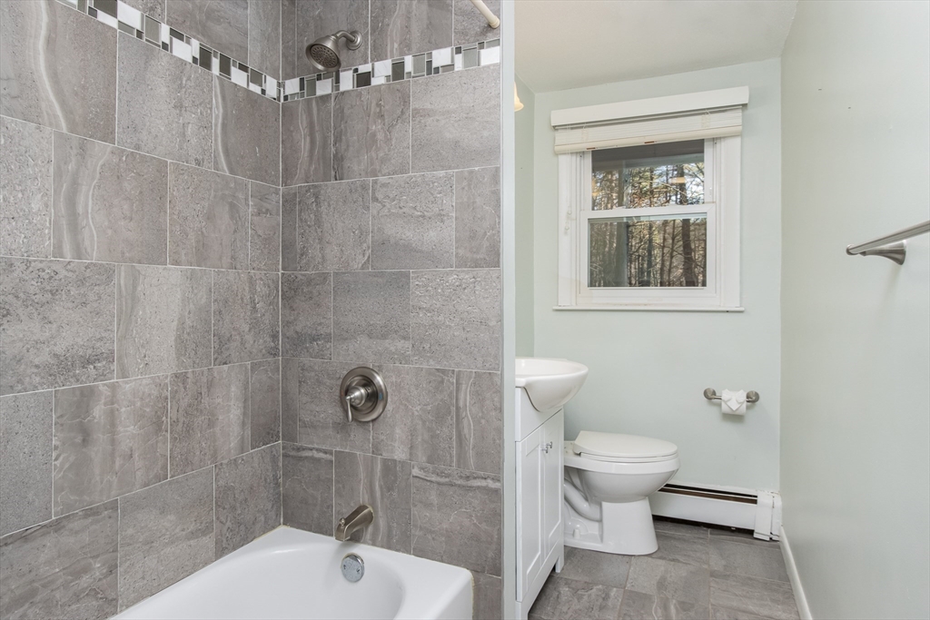 7 No Name Road Stow, MA 01775 - Photo 33 of 42 a bathroom with a toilet a sink and shower