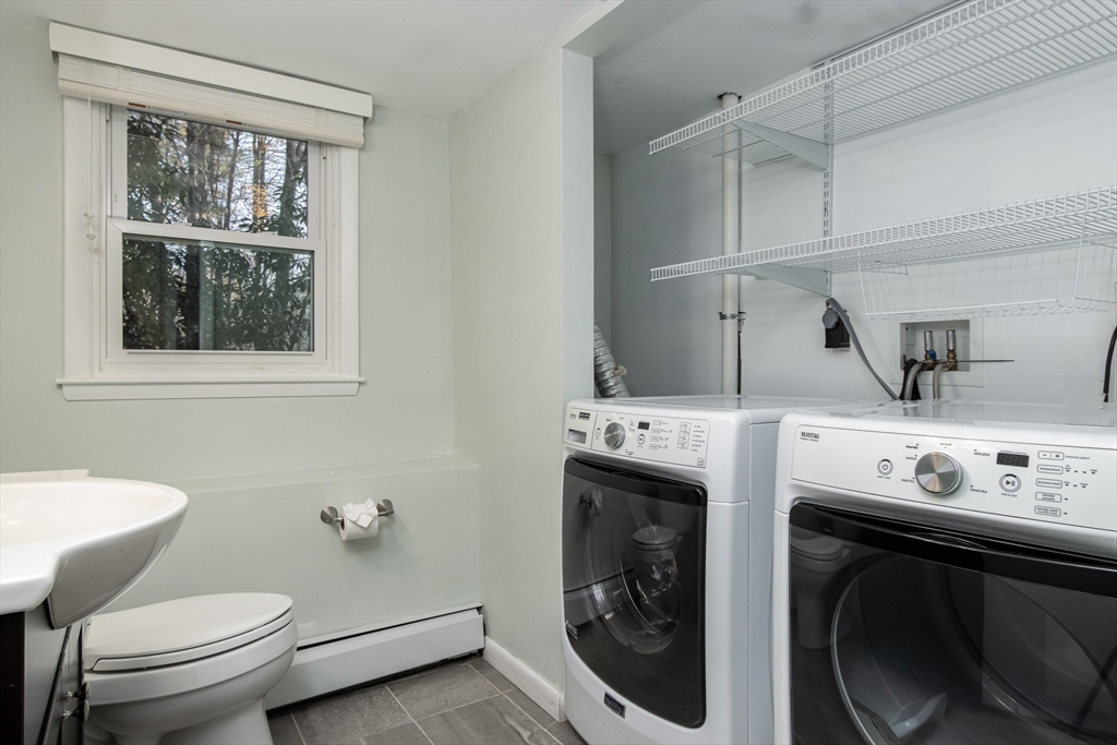 7 No Name Road Stow, MA 01775 - Photo 37 of 42 a utility room with dryer washer and a window