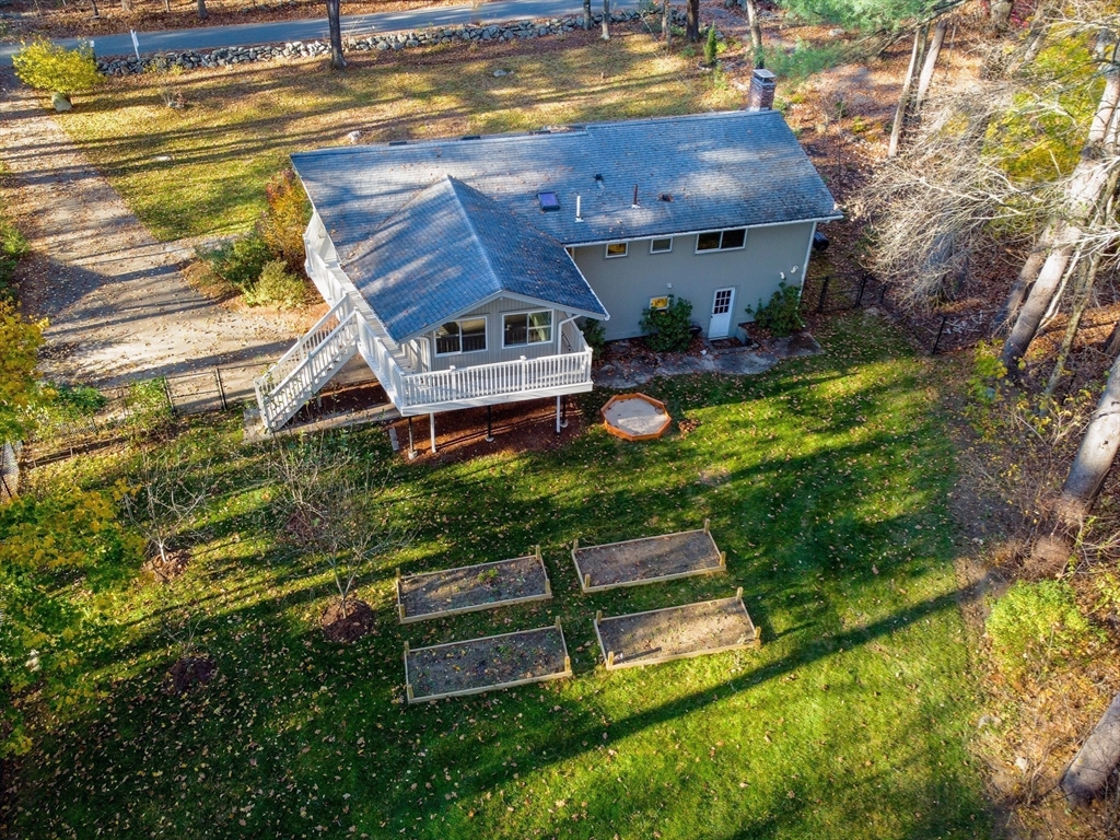 7 No Name Road Stow, MA 01775 - Photo 6 of 42 an aerial view of a house with swimming pool