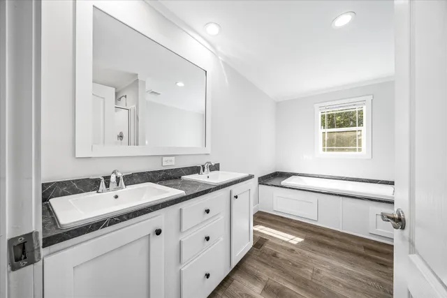a bathroom with a sink and a shower