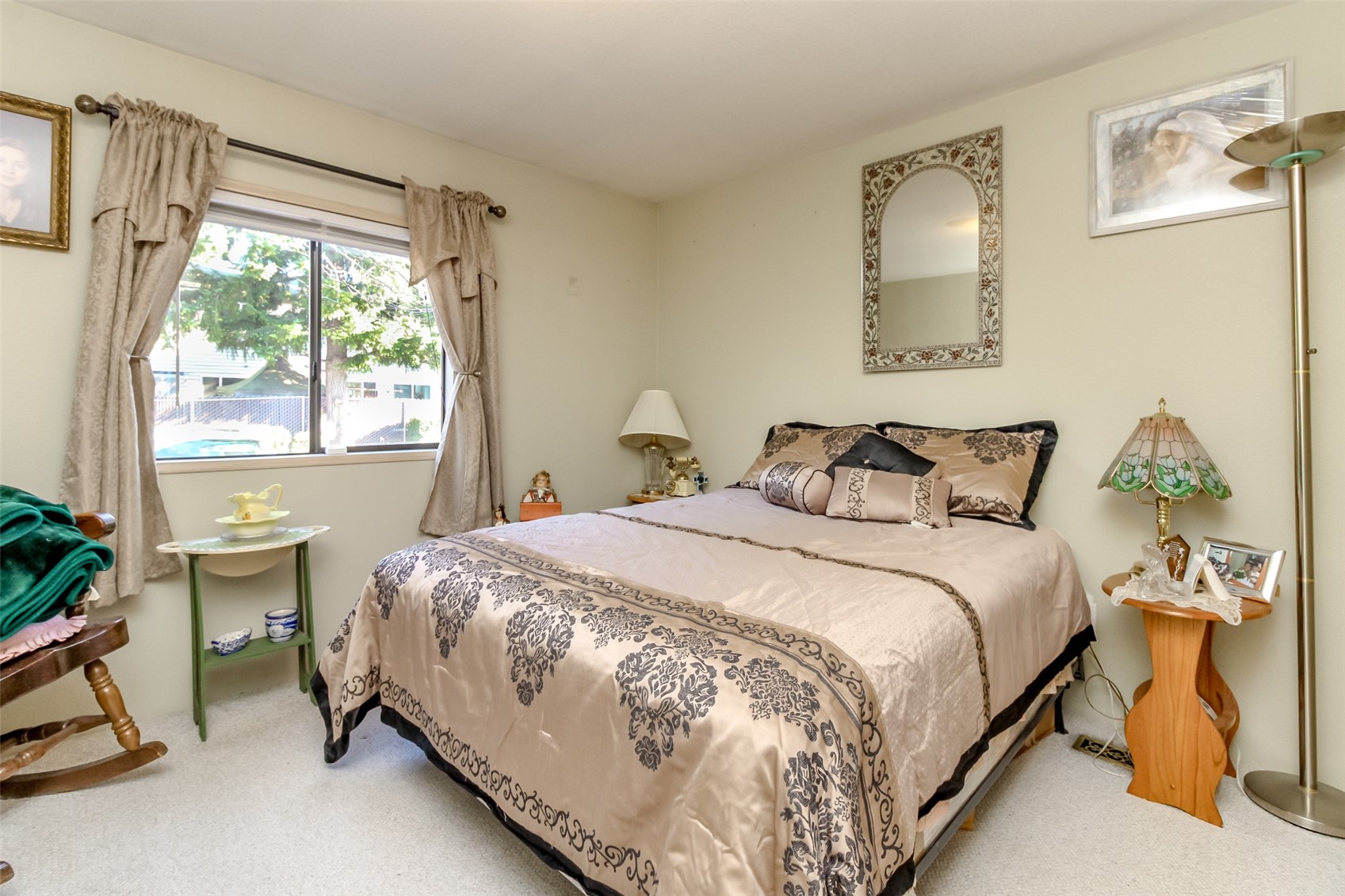 2611 South 288th Street, Unit 74 Federal Way, WA 98003 - Photo 13 of 30 a bedroom with a bed and a window