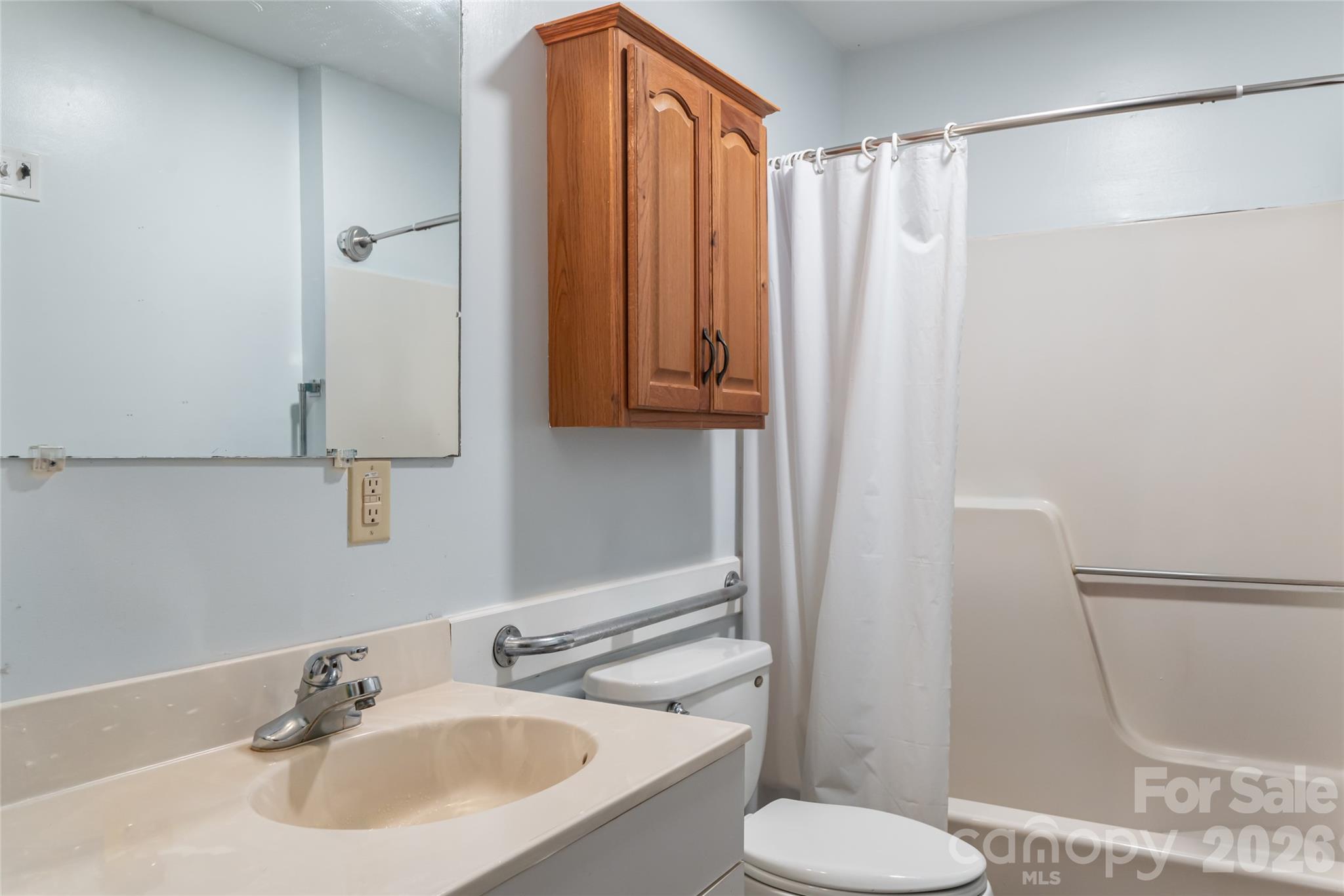 2800 Coxe Road Tryon, NC 28782 - Photo 33 of 40 a bathroom with a sink toilet and shower