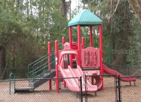 a view of a chairs and table in the balcony