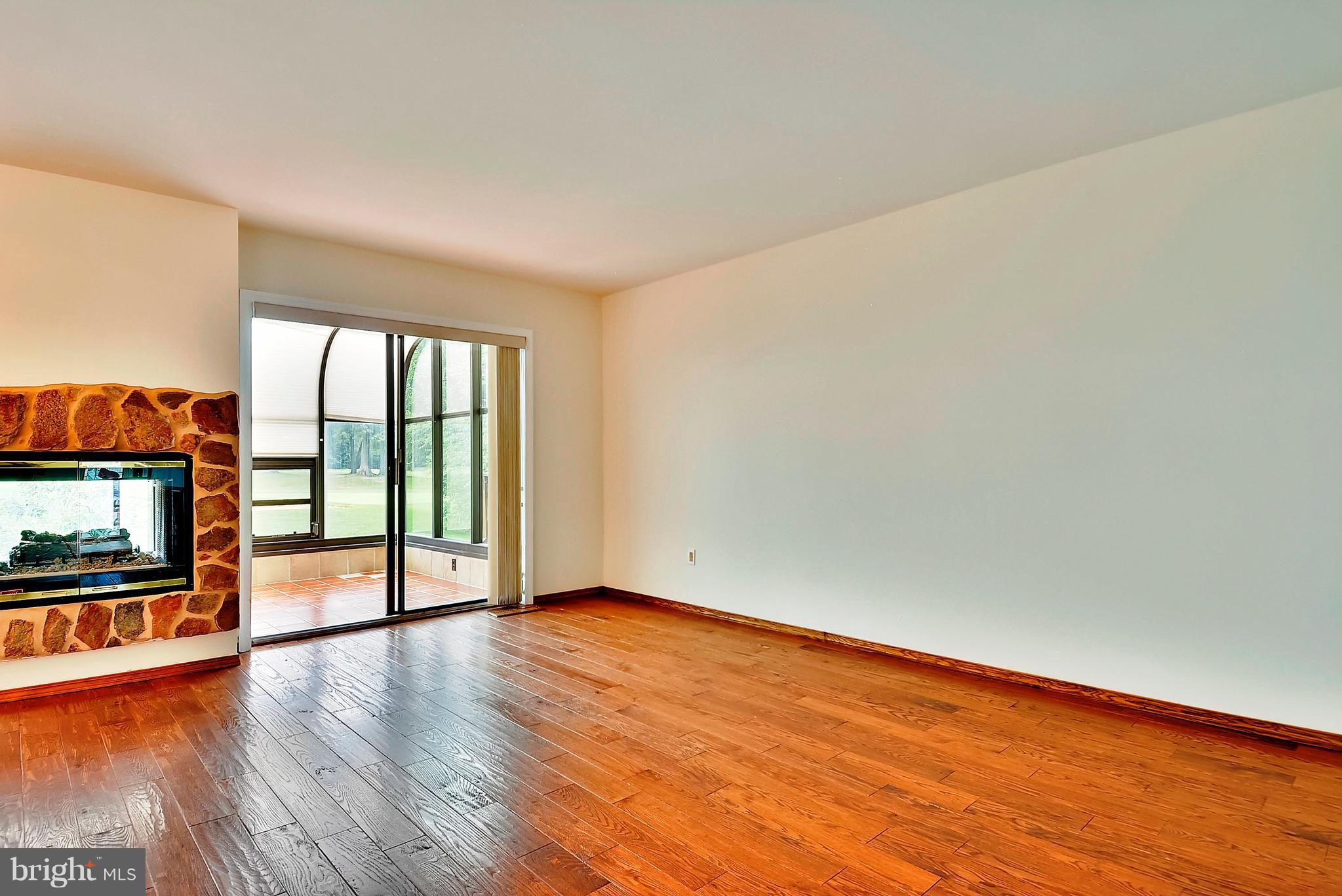 2019 Sarazen Place Reston, VA 20191 - Photo 11 of 30 Room abuts to sun room;awesome gas fireplace