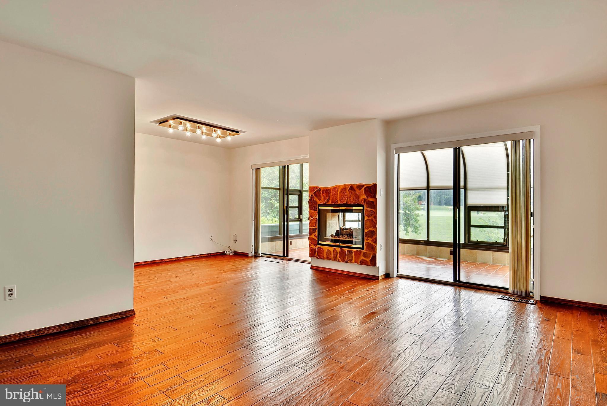 2019 Sarazen Place Reston, VA 20191 - Photo 8 of 30 Main level has new random width hardwood floors