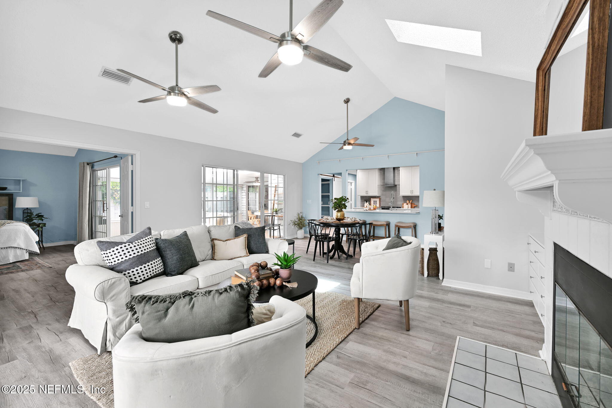 107 Hammock Circle St. Augustine, FL 32084 - Photo 11 of 76 a living room with furniture and a chandelier