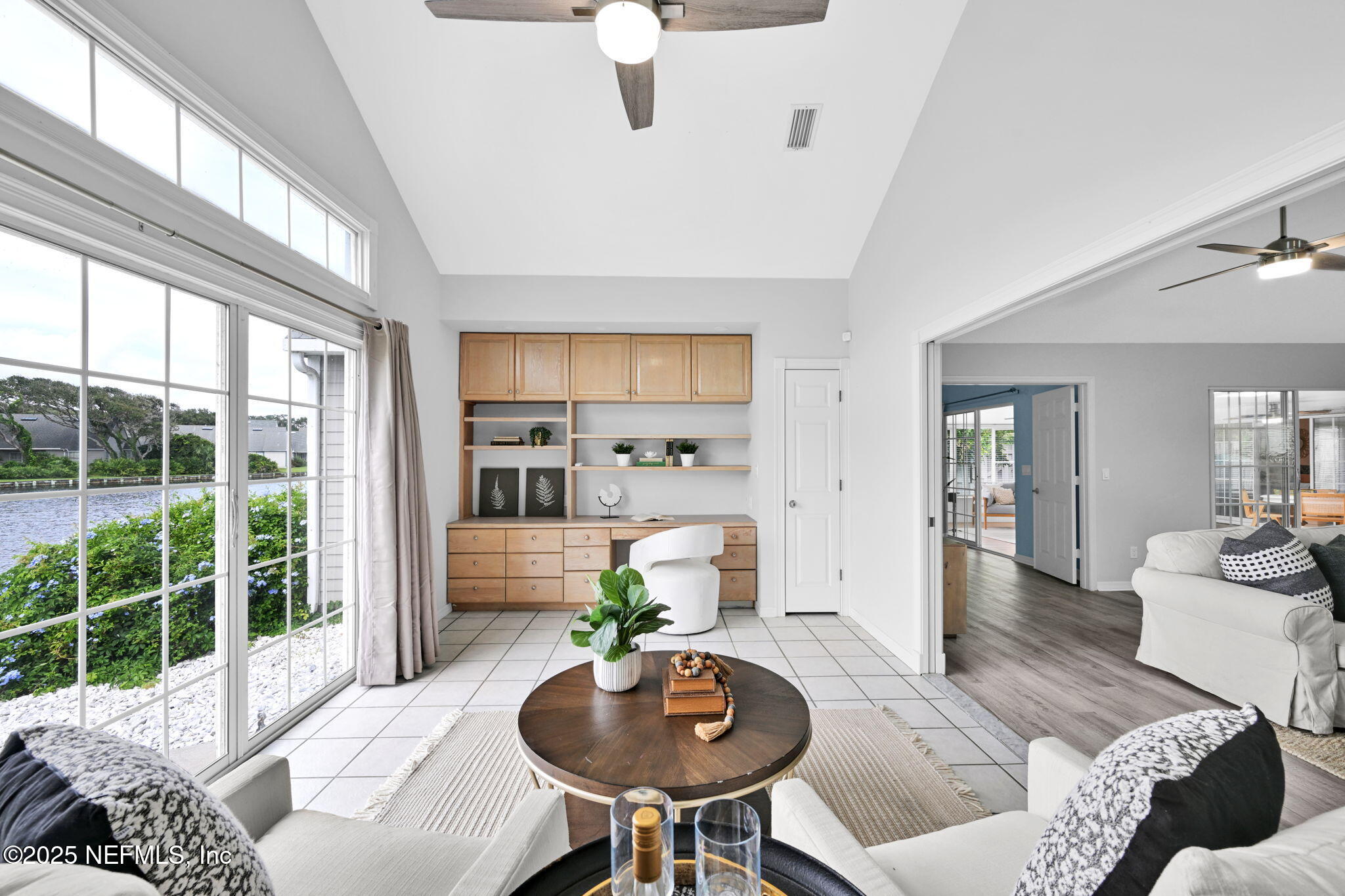 107 Hammock Circle St. Augustine, FL 32084 - Photo 12 of 76 a living room with furniture and a potted plant