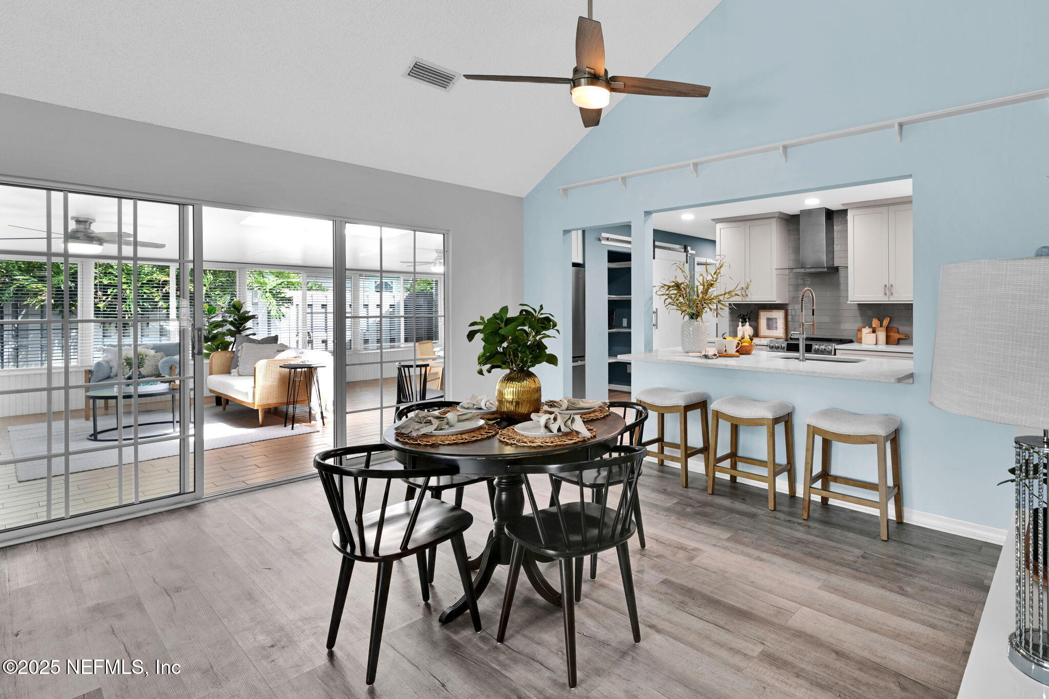 107 Hammock Circle St. Augustine, FL 32084 - Photo 19 of 76 a view of a dining room with furniture window and wooden floor