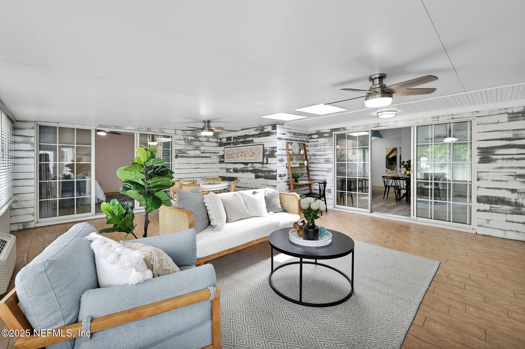 107 Hammock Circle St. Augustine, FL 32084 - Photo 45 of 76 a living room with furniture and a large window