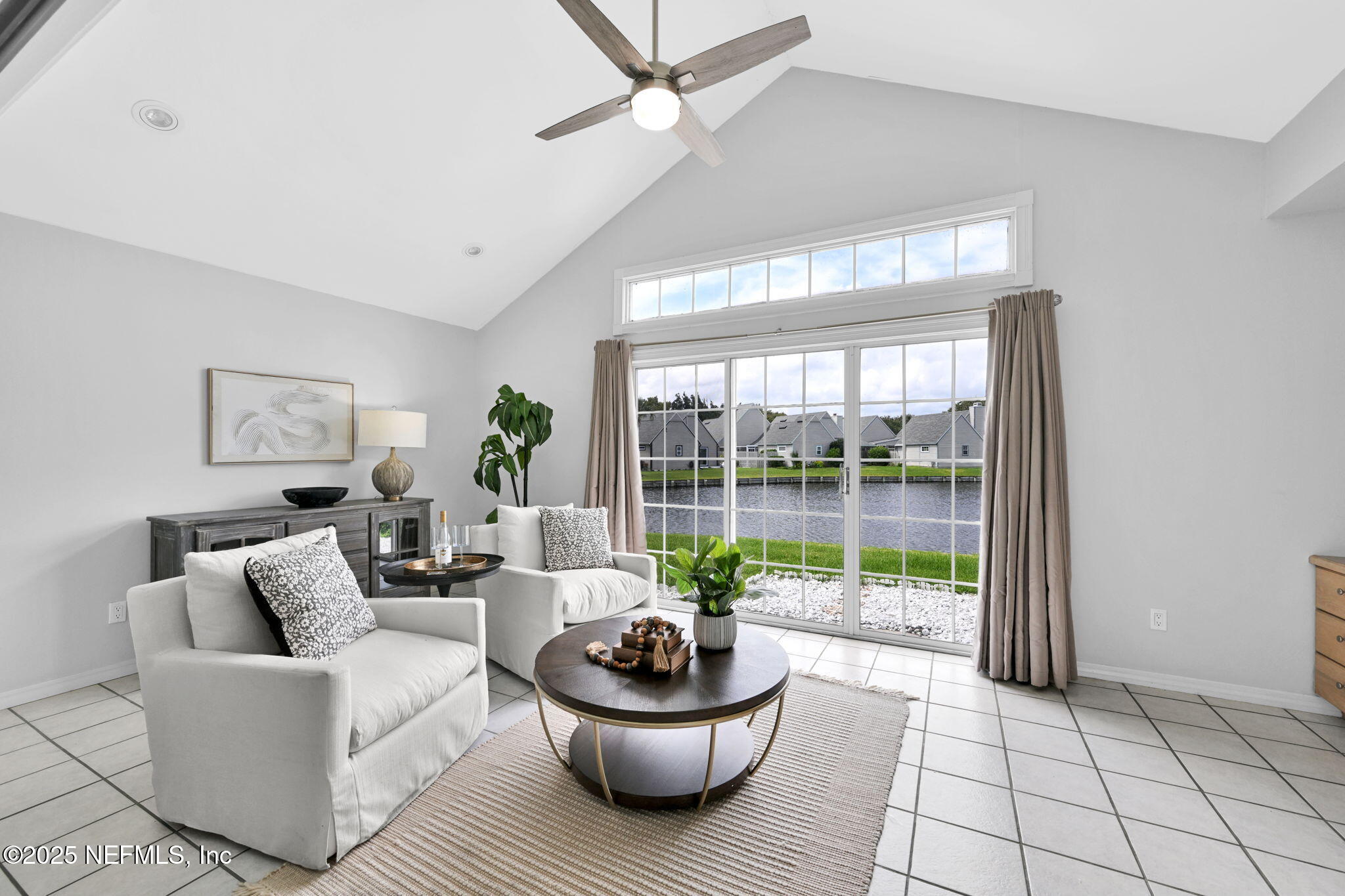 107 Hammock Circle St. Augustine, FL 32084 - Photo 10 of 76 a living room with furniture and a large window