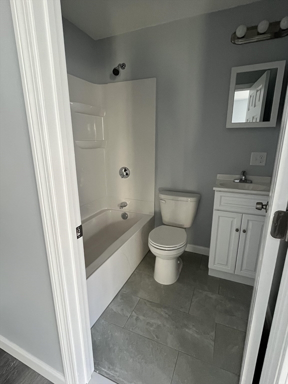 106 Kilburn Street, Unit 1N Fall River, MA 02724 - Photo 4 of 7 a bathroom with a toilet and a bathtub