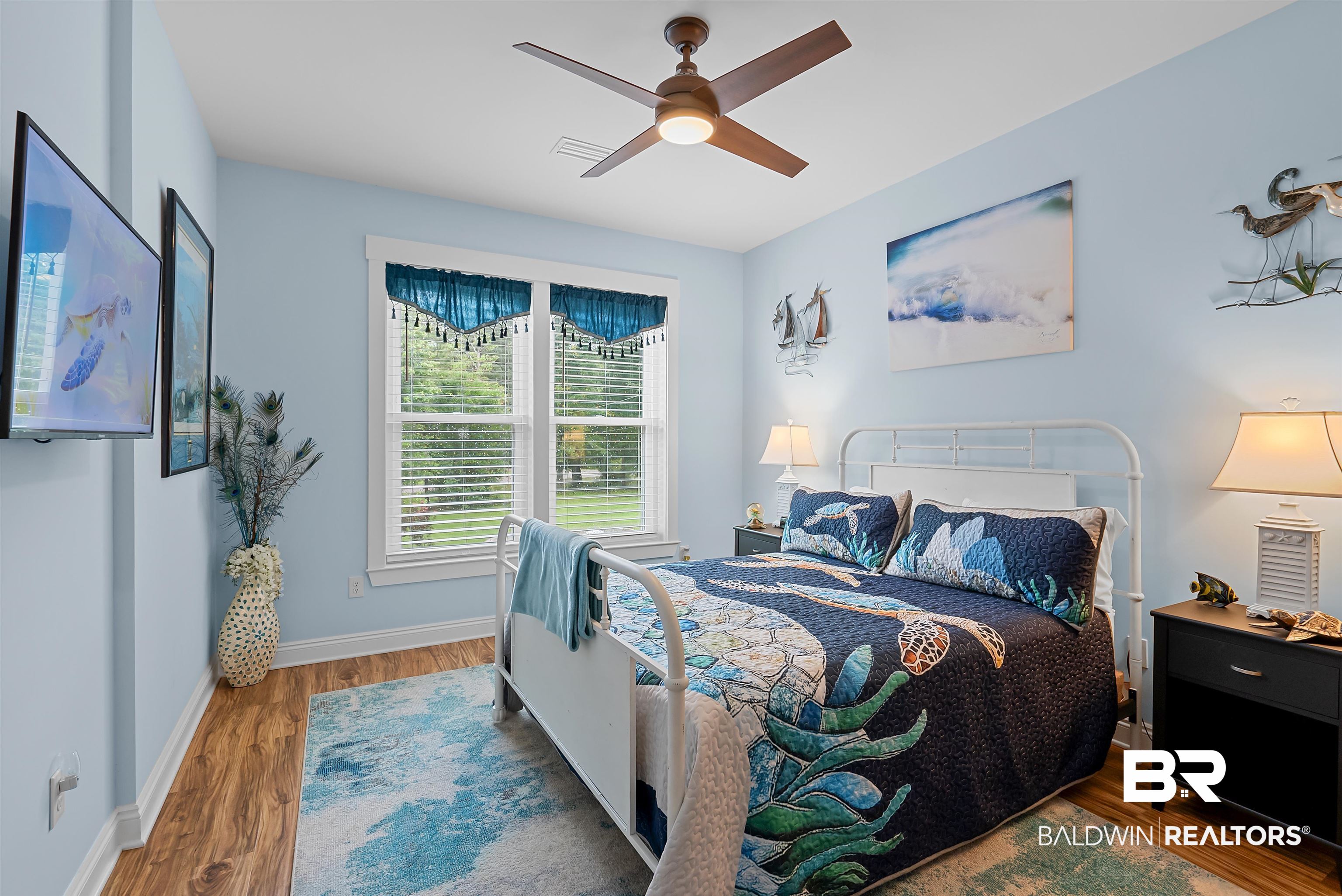 7266 Franklin Road Foley, AL 36535 - Photo 34 of 64 Bedroom featuring wood-finish flooring, a ceiling fan with integrated lighting, and a window with blinds