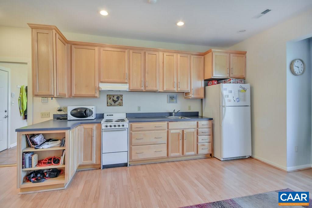 620 Beaver Pond Ridge Troy, VA 22974 - Photo 20 of 49 View of the apartment kitchen from living area (currently used for an exercise room)