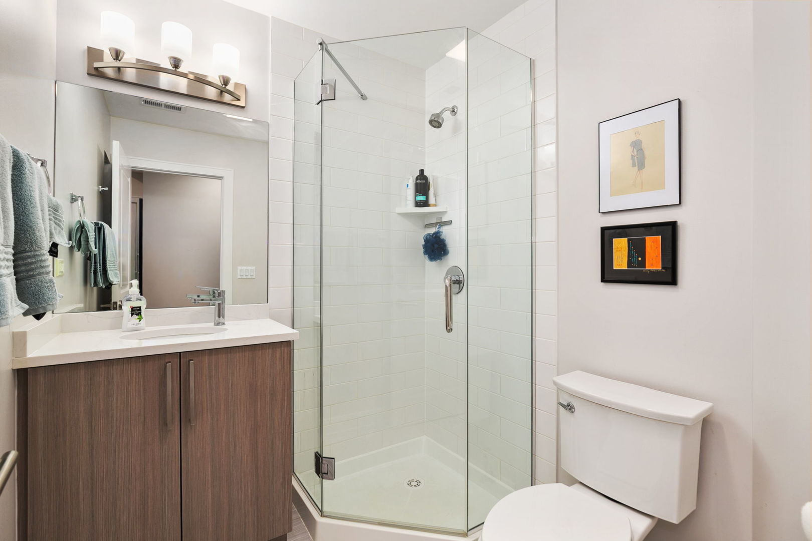 807 West Bradley Place, Unit 2 Chicago, IL 60613 - Photo 19 of 26 a bathroom with a sink a toilet and shower