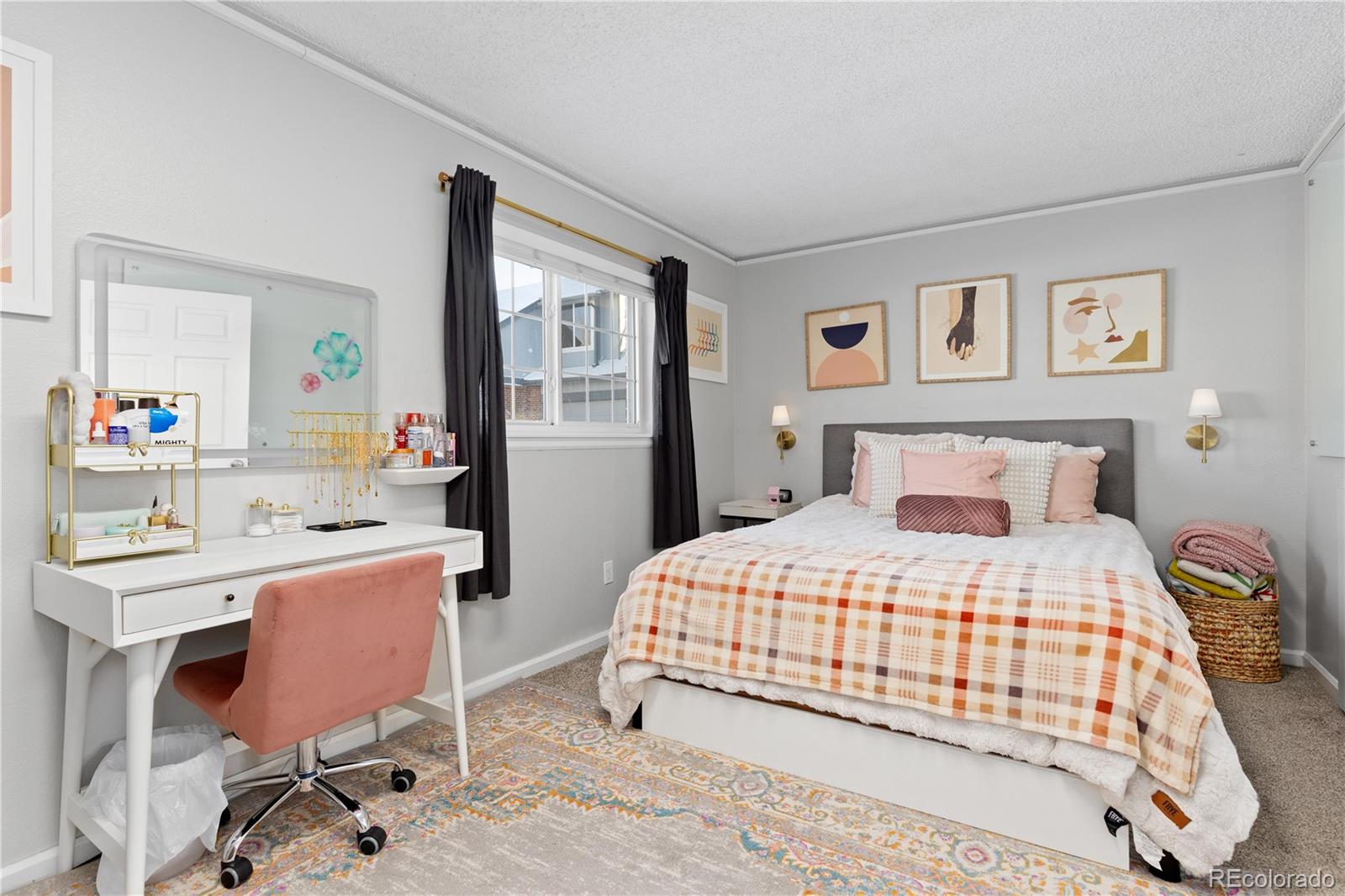 9364 Cattail Court Highlands Ranch, CO 80126 - Photo 18 of 31 a bedroom with a bed and a table in it