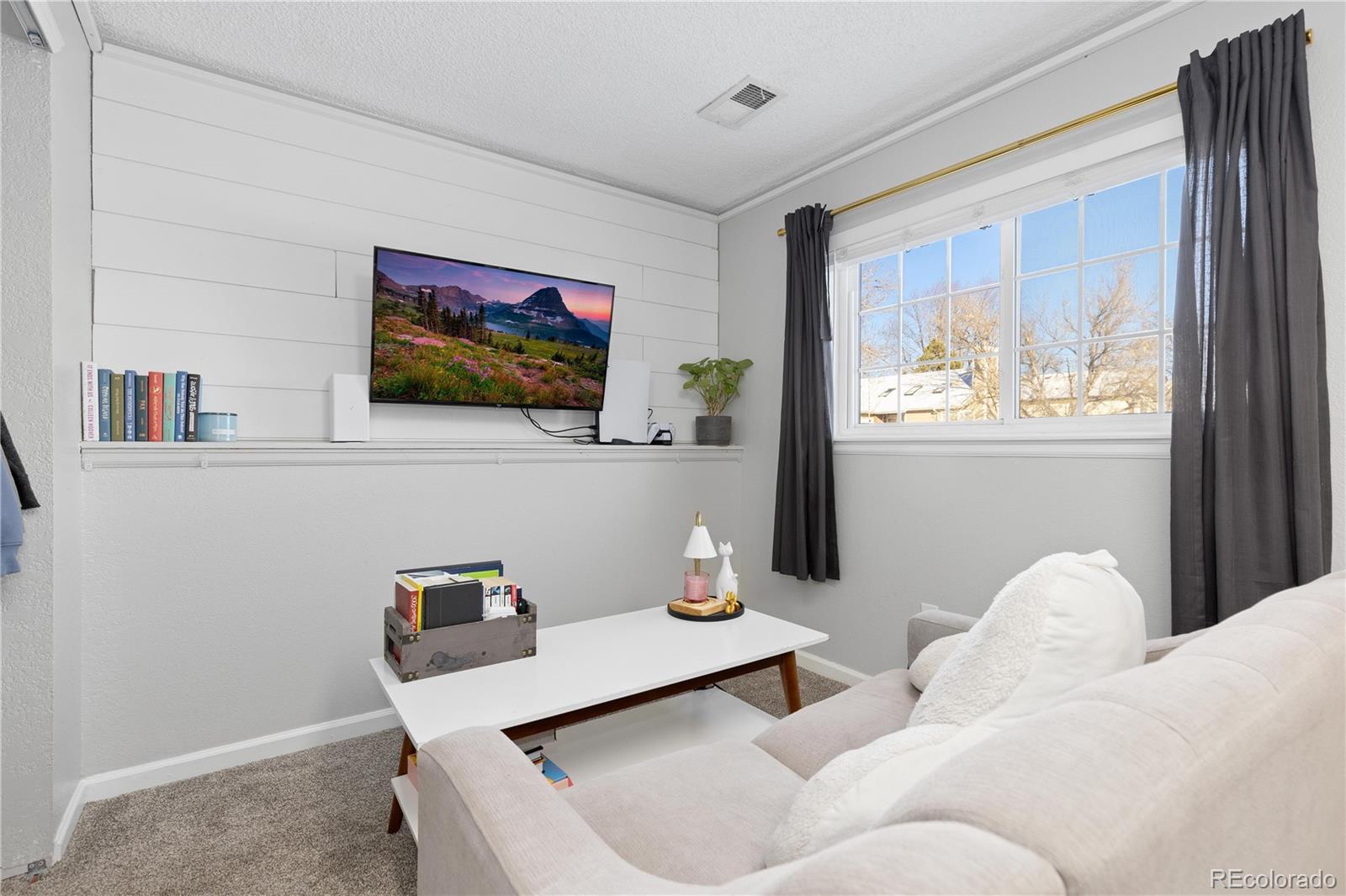 9364 Cattail Court Highlands Ranch, CO 80126 - Photo 20 of 31 a living room with furniture and window