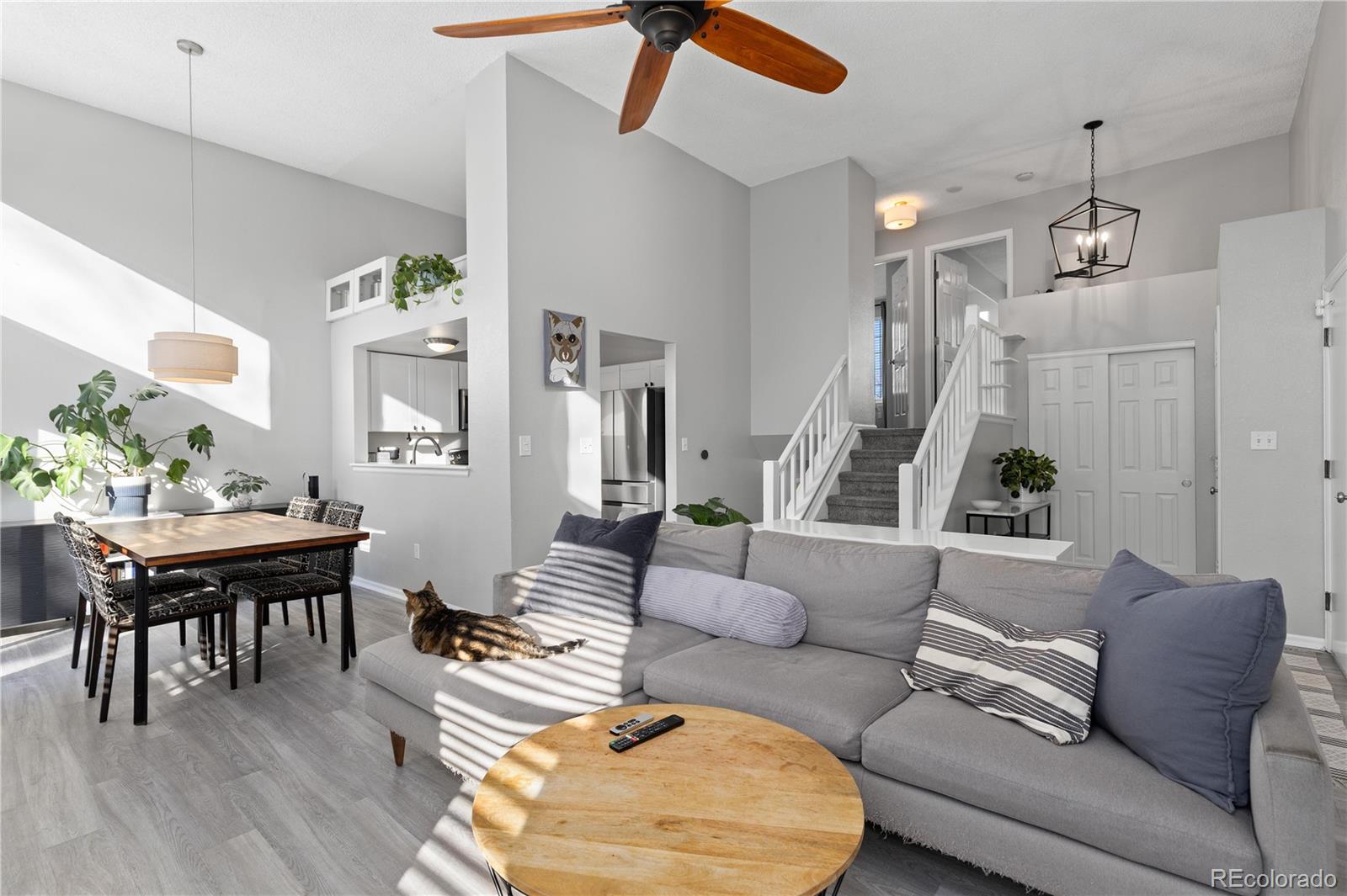 9364 Cattail Court Highlands Ranch, CO 80126 - Photo 8 of 31 a living room with furniture and wooden floor