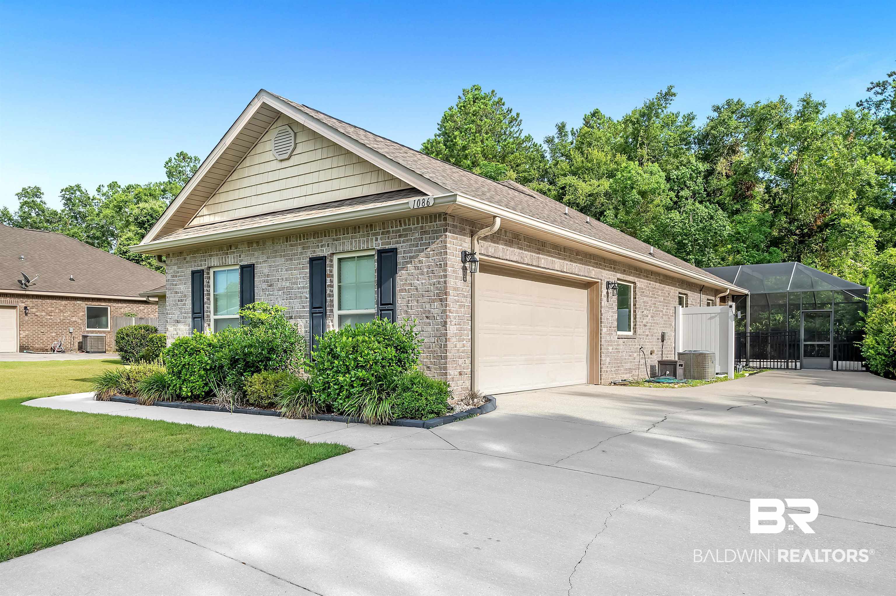 1086 Melbourne Court Foley, AL 36535 - Photo 37 of 43 Single story home featuring a garage and a front lawn