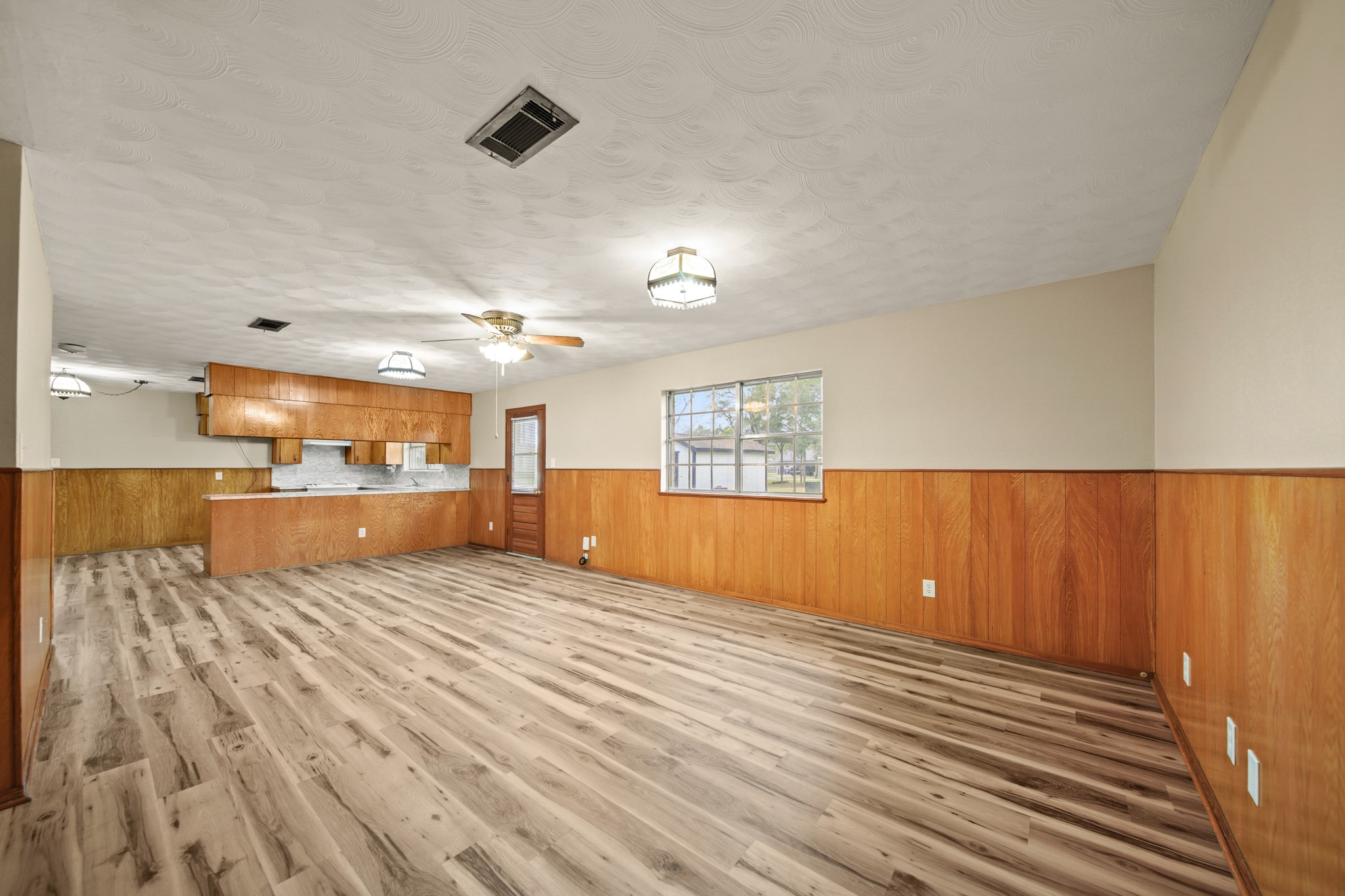 1438 County Road 348 Brazoria, TX 77422 - Photo 12 of 25 a view of a room with wooden floor