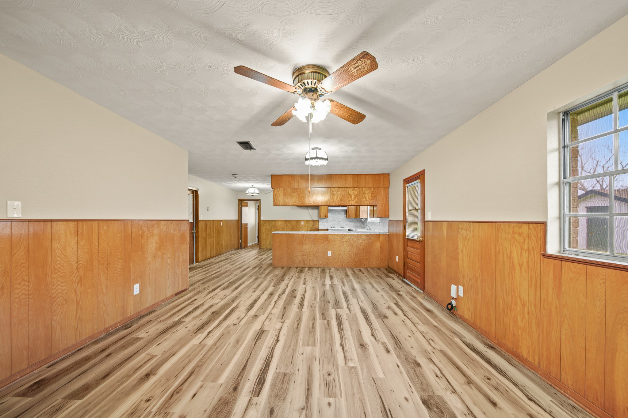 1438 County Road 348 Brazoria, TX 77422 - Photo 13 of 25 a view of a living room with a kitchen