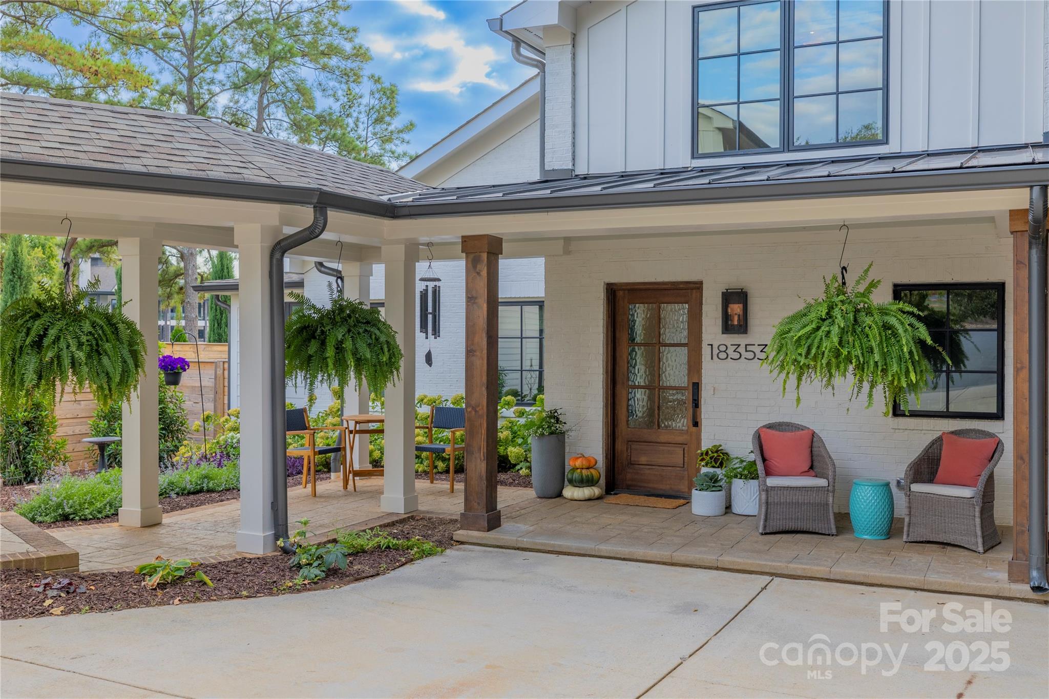 a front view of house with small garden