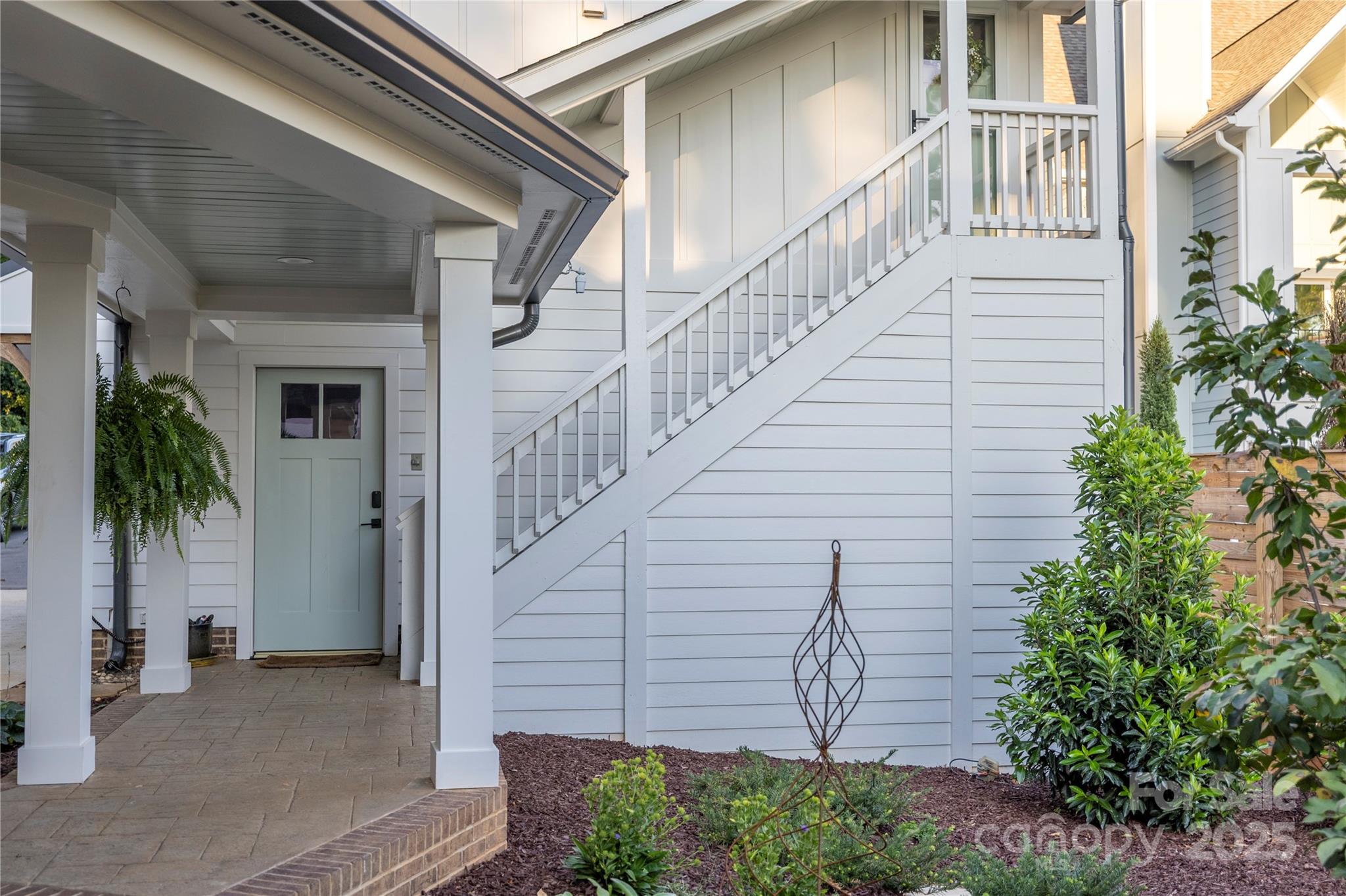 18353 John Connor Road Cornelius, NC 28031 - Photo 34 of 47 a house with trees in front of it